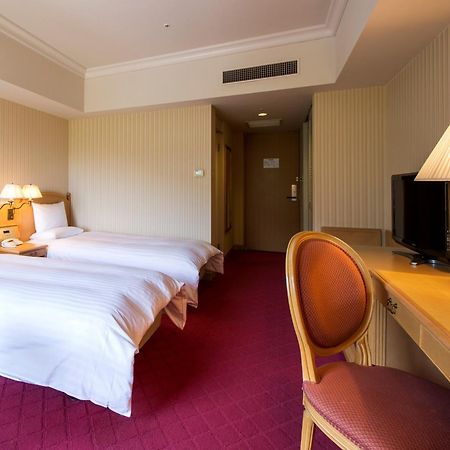 Hotel Okura Jr Huis Ten Bosch Szaszebo Kültér fotó A room at the hotel