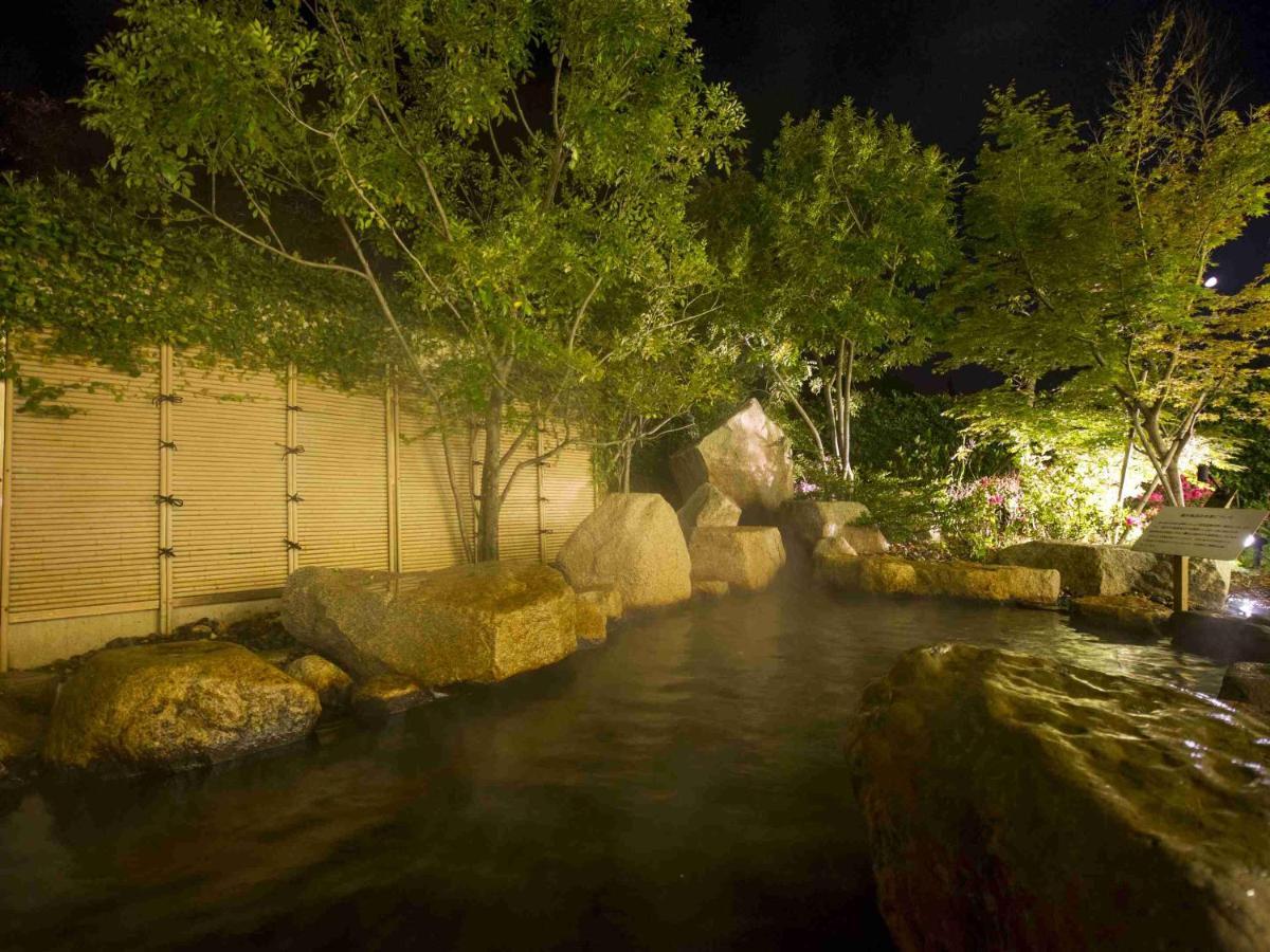 Hotel Okura Jr Huis Ten Bosch Szaszebo Kültér fotó The river at night