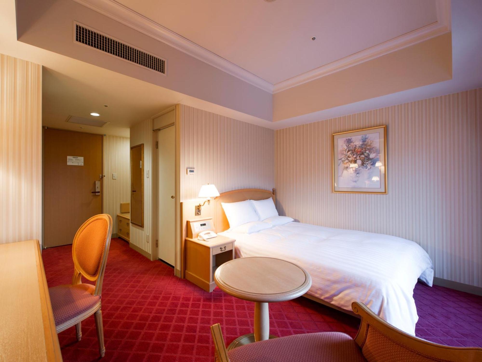 Hotel Okura Jr Huis Ten Bosch Szaszebo Kültér fotó A room at the hotel