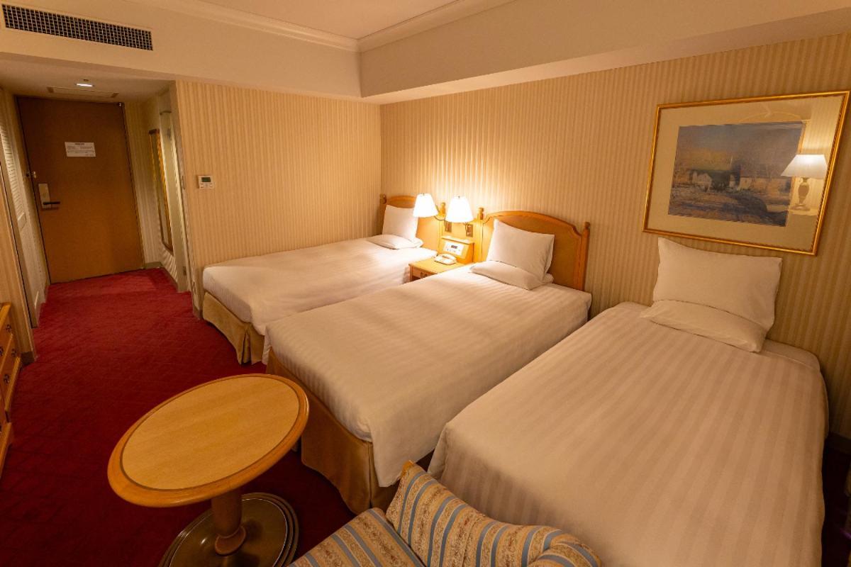 Hotel Okura Jr Huis Ten Bosch Szaszebo Kültér fotó A room at the hotel