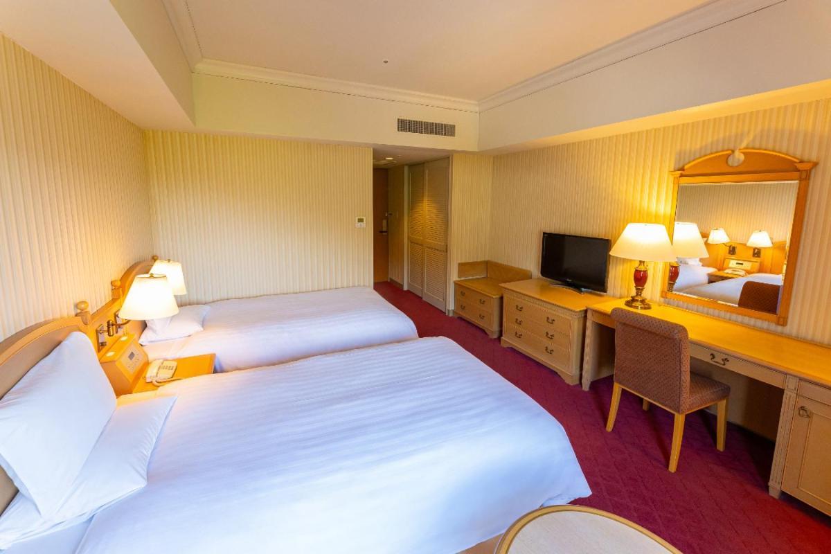Hotel Okura Jr Huis Ten Bosch Szaszebo Kültér fotó A room at the hotel